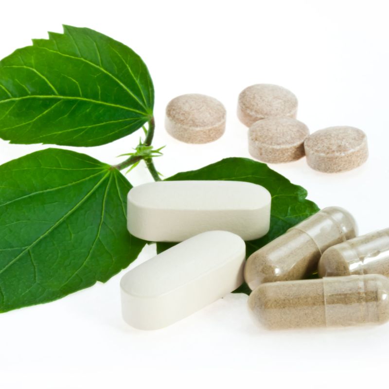 Supplements with plant leaf kept on side