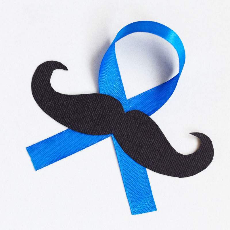Blue Ribbon with black moustache stick to it