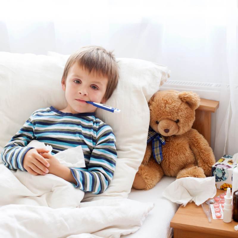 Sick kid with teddy